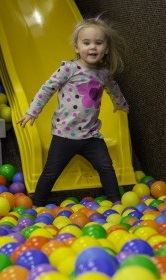 Little Girl in Ball Pit
